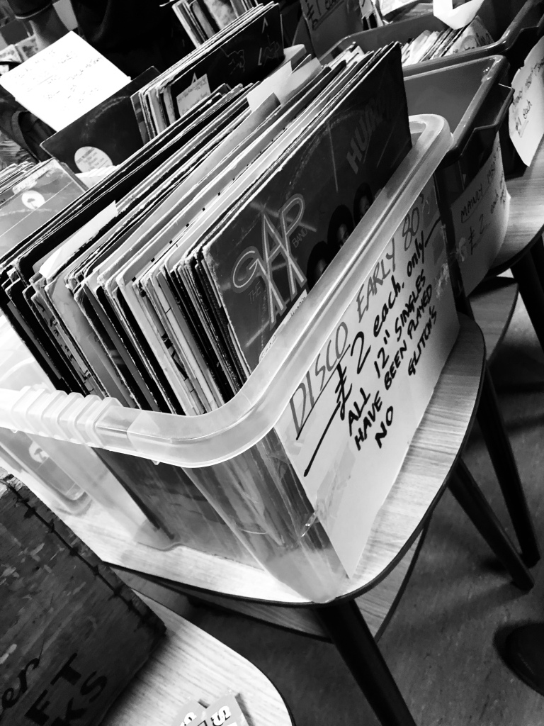 Box of records on a stall table